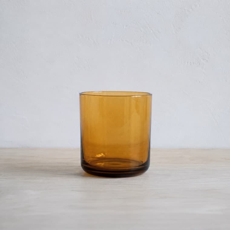 Water Glass 250 ml in amber, photographed under daylight: north-facing window, no direct sun, about 5600 k.